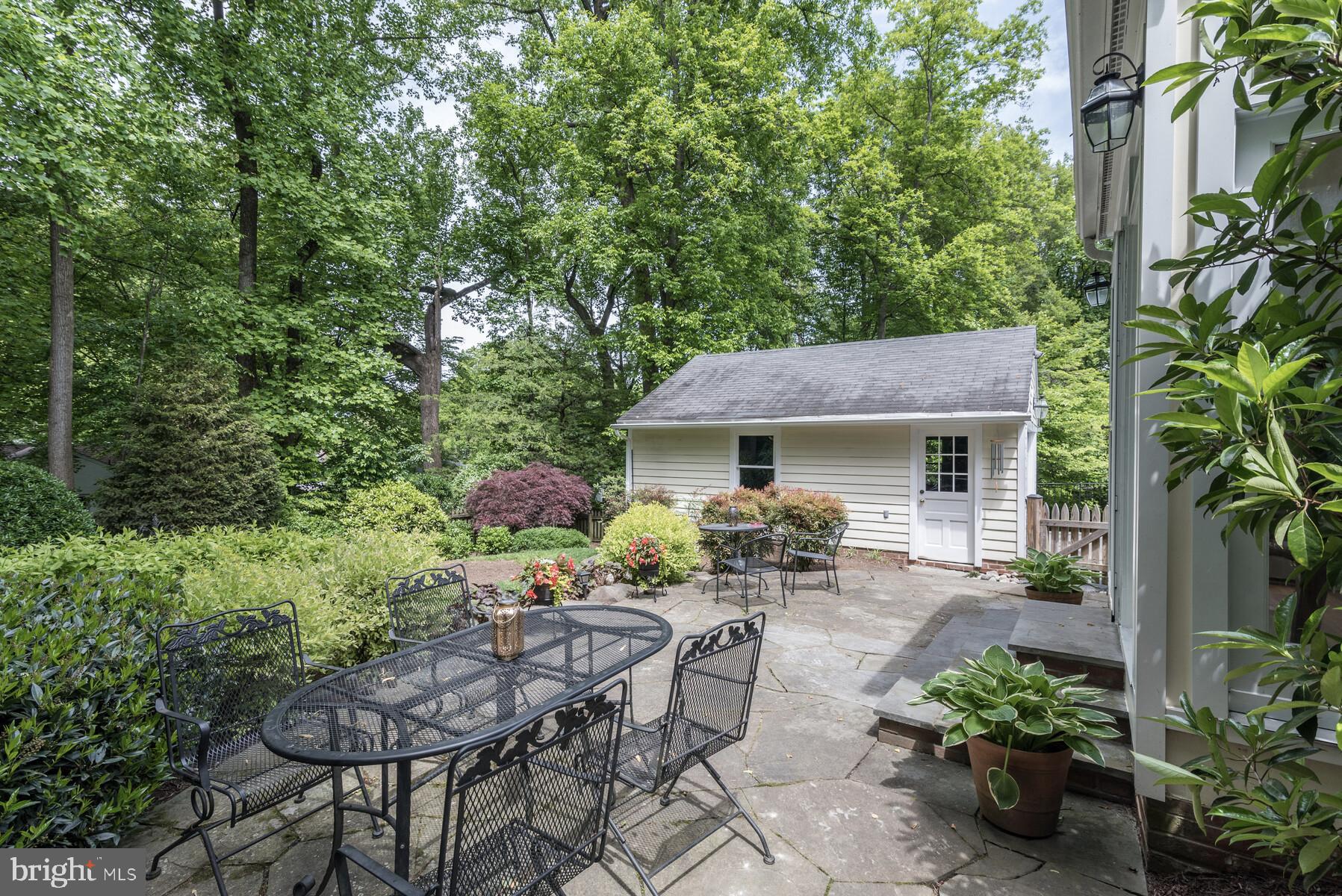 6002 Cobalt Road Bethesda, MD 20816 - Photo 7 of 38 Flagstone patio just off kitchen, w 2-car garage