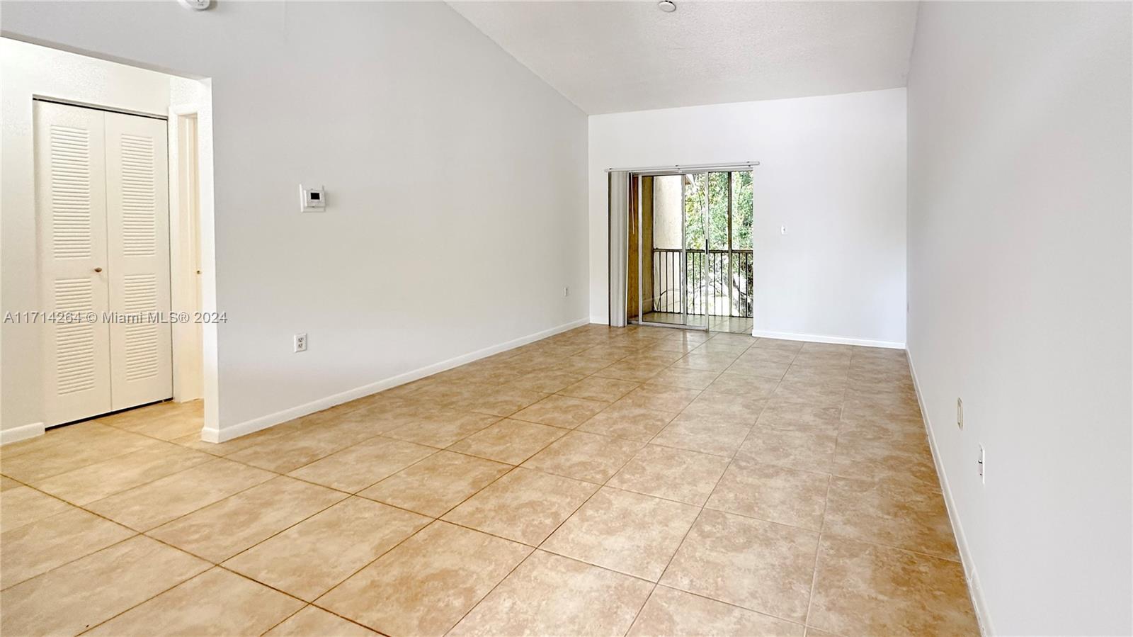 2218 Southwest 81st Avenue, Unit 2218 Miramar, FL 33025 - Photo 14 of 16 an empty room with windows