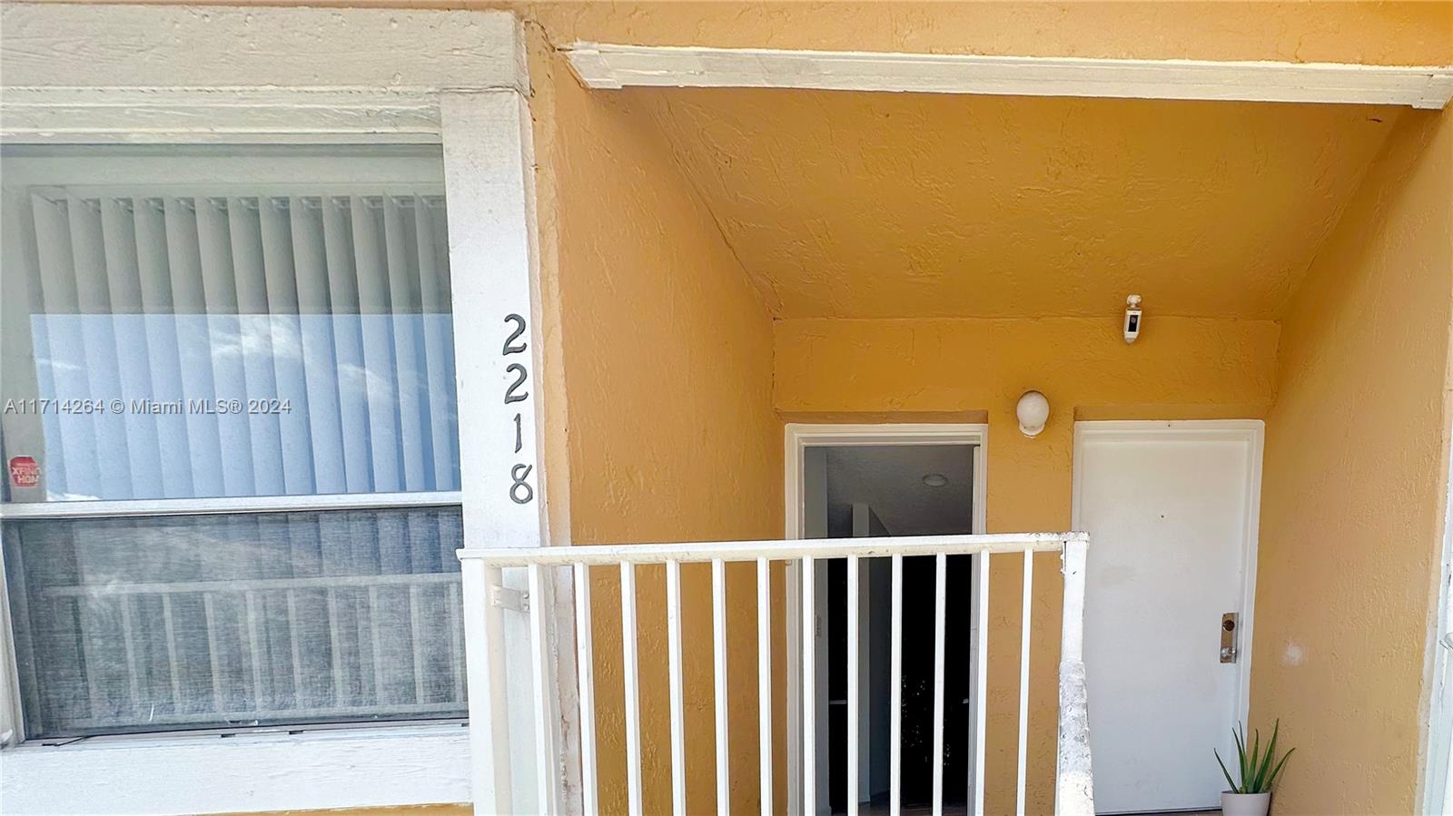2218 Southwest 81st Avenue, Unit 2218 Miramar, FL 33025 - Photo 2 of 16 a view of a balcony