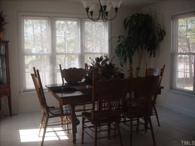 4201 Cheek Road Durham, NC 27704 - Photo 4 of 8 welcome to the sunroom