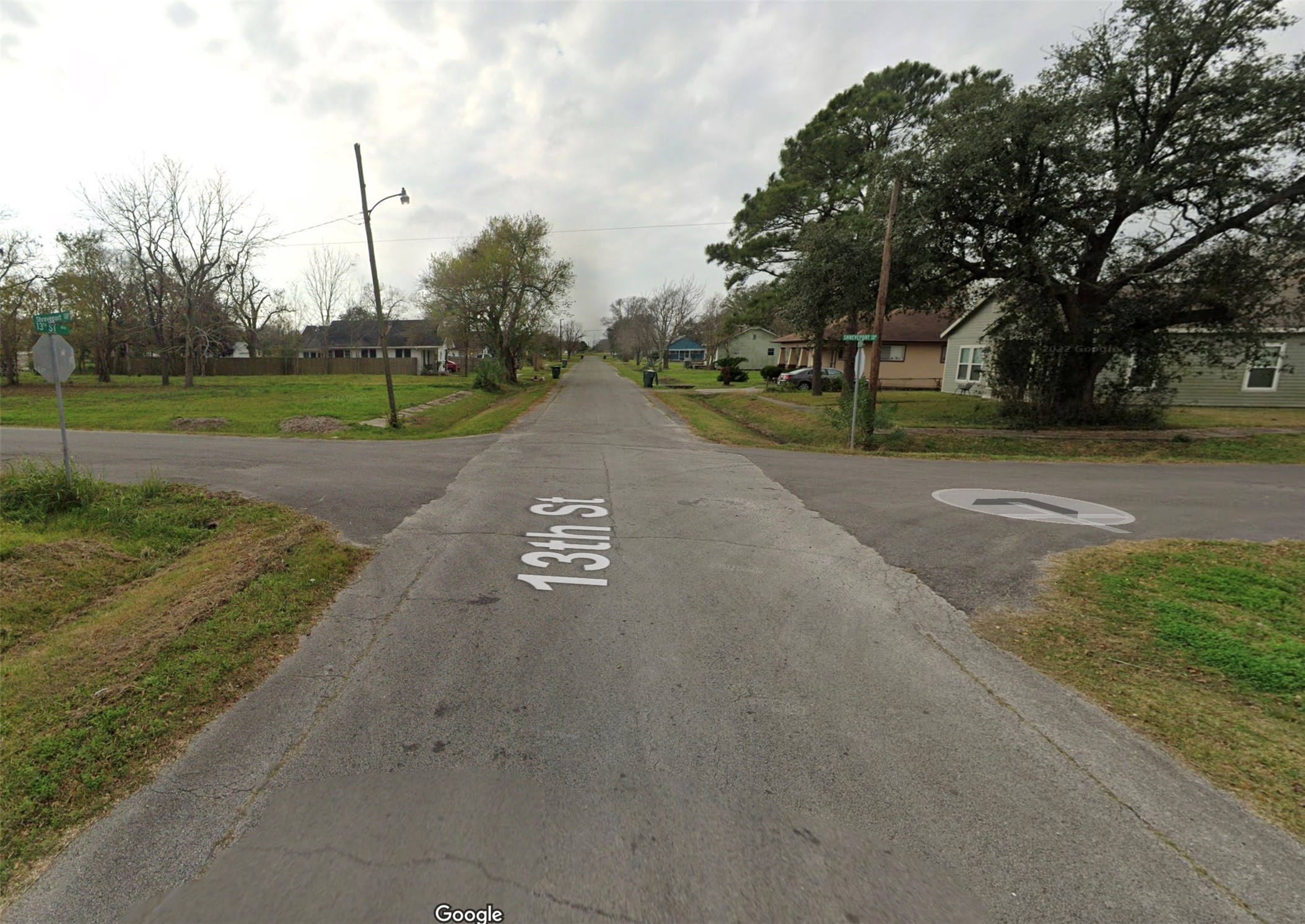 801 13th Street Port Arthur, TX 77640 - Photo 7 of 7 a view of a street with a park