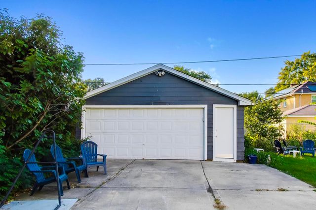 a white wall with picture on the wall and white walls