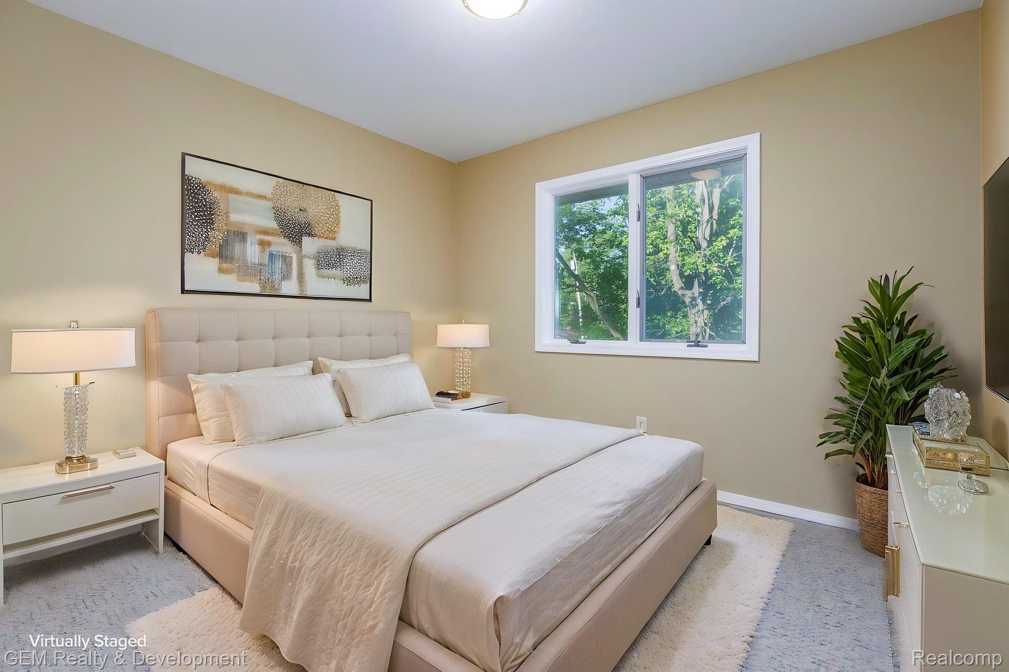 1111 Sarah Pinckney, MI 48169 - Photo 21 of 39 Recessed lighting illuminates neutral-toned walls