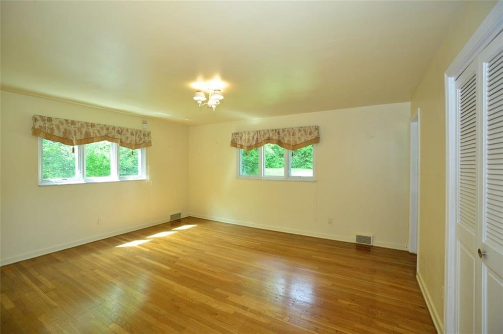 9600 Sheraton Road Pittsburgh, PA 15237 - Photo 8 of 15 Master bedroom with hardwood floors, newer Pella windows and master bath.