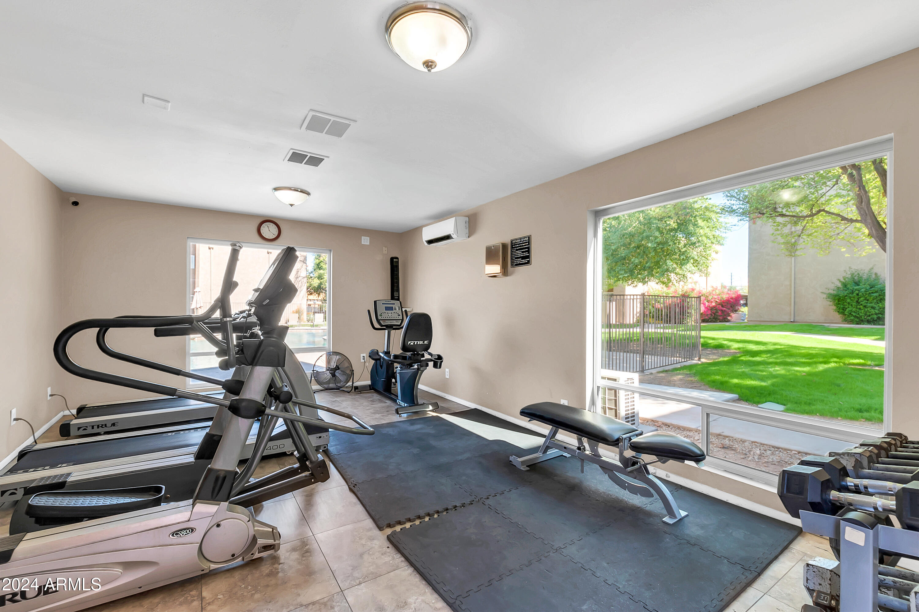 5525 East Thomas Road, Unit F9 Phoenix, AZ 85018 - Photo 20 of 48 a view of a room with gym equipment