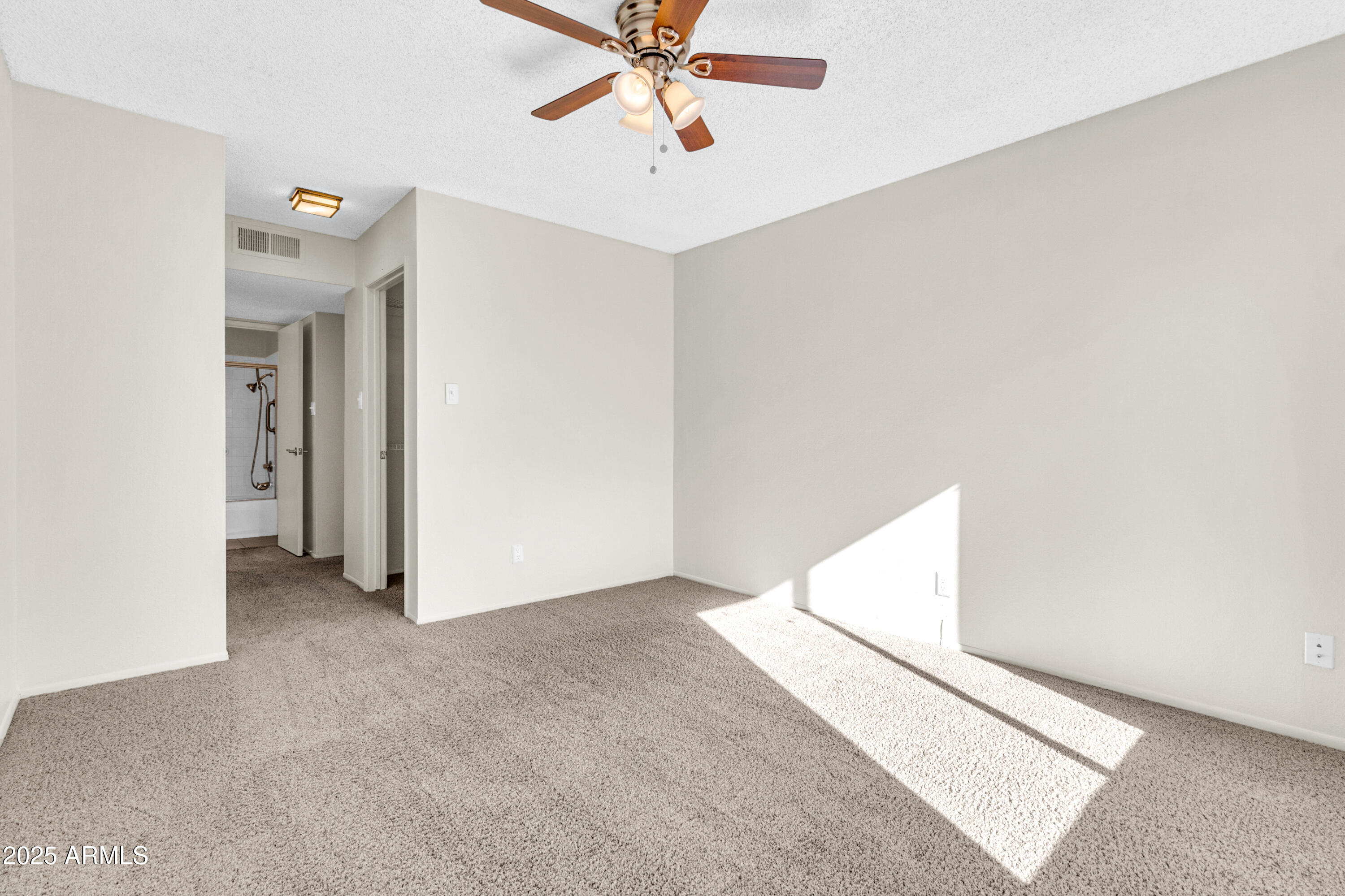 5525 East Thomas Road, Unit F9 Phoenix, AZ 85018 - Photo 30 of 48 a view of a hallway with closet