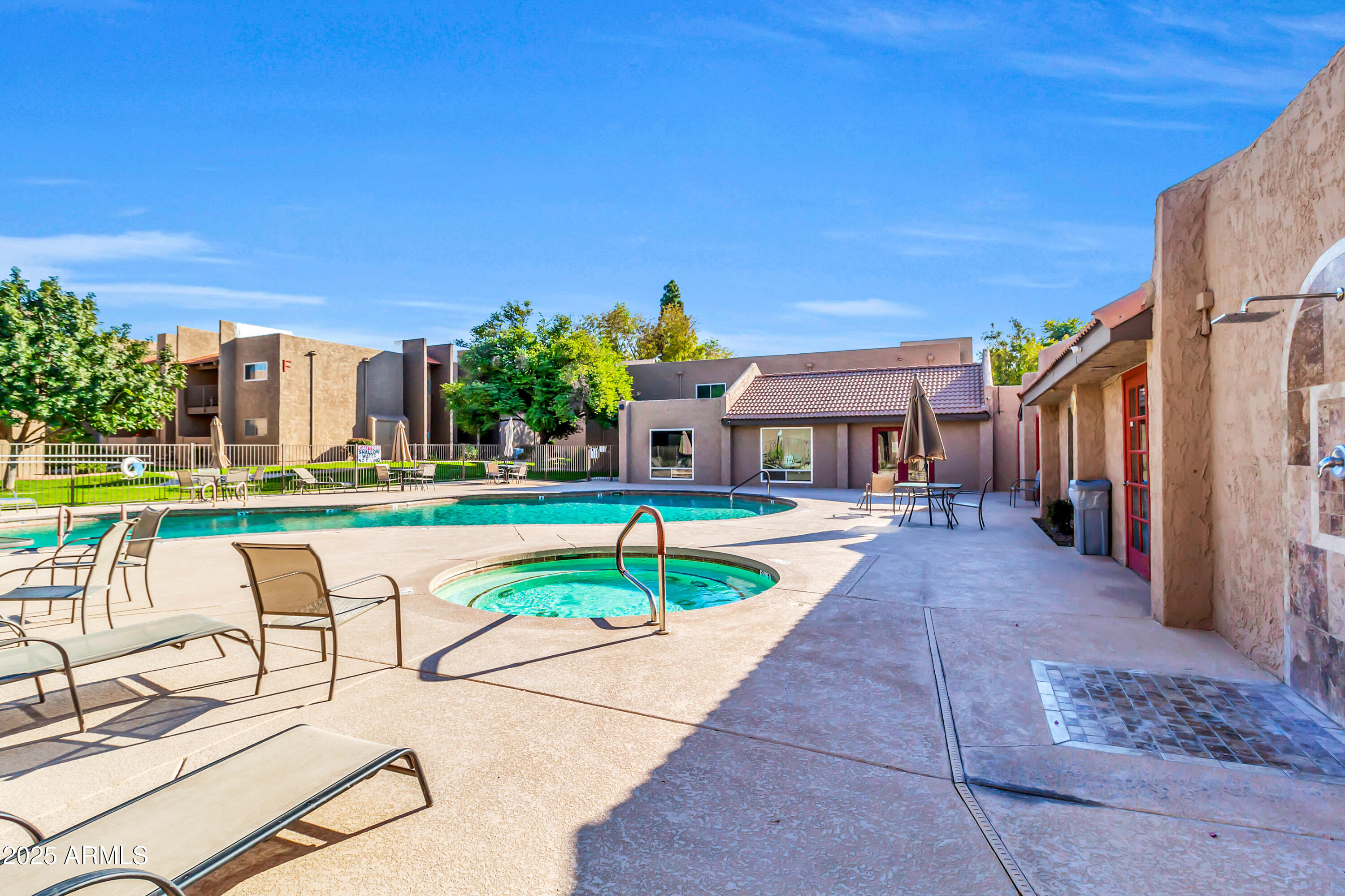 5525 East Thomas Road, Unit F9 Phoenix, AZ 85018 - Photo 40 of 48 a house with swimming pool in front of it