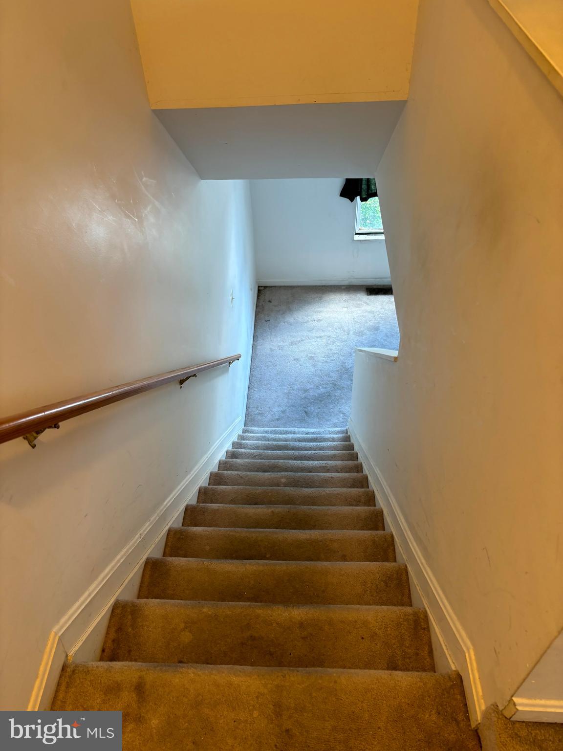 4628 Warren Tree Way Baltimore, MD 21229 - Photo 8 of 19 STAIRS FROM UPPER LEVEL TO MAIN LEVEL