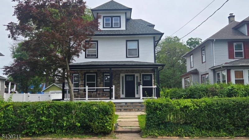 1324 George Street Plainfield, NJ 07062 - Photo 25 of 26 a front view of a house with a yard
