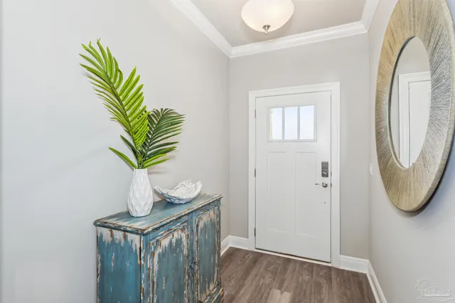 a view of a entryway with wooden floor
