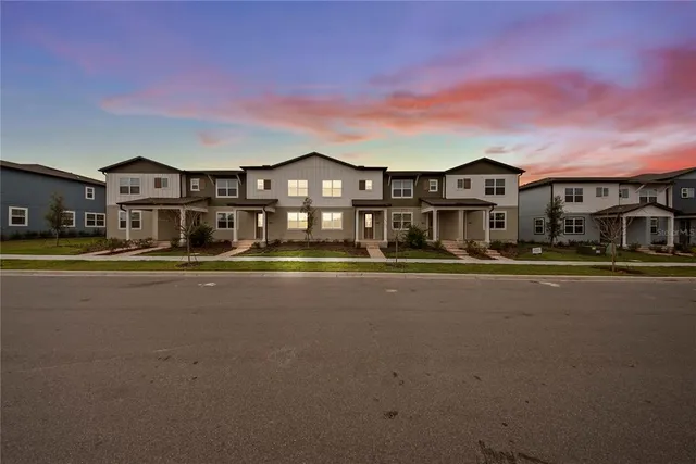 a front view of a house with a ocean view