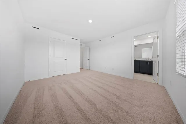 a view of a hallway with staircase