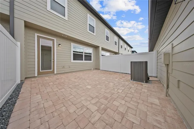 a view of outdoor space swimming pool and outdoor seating