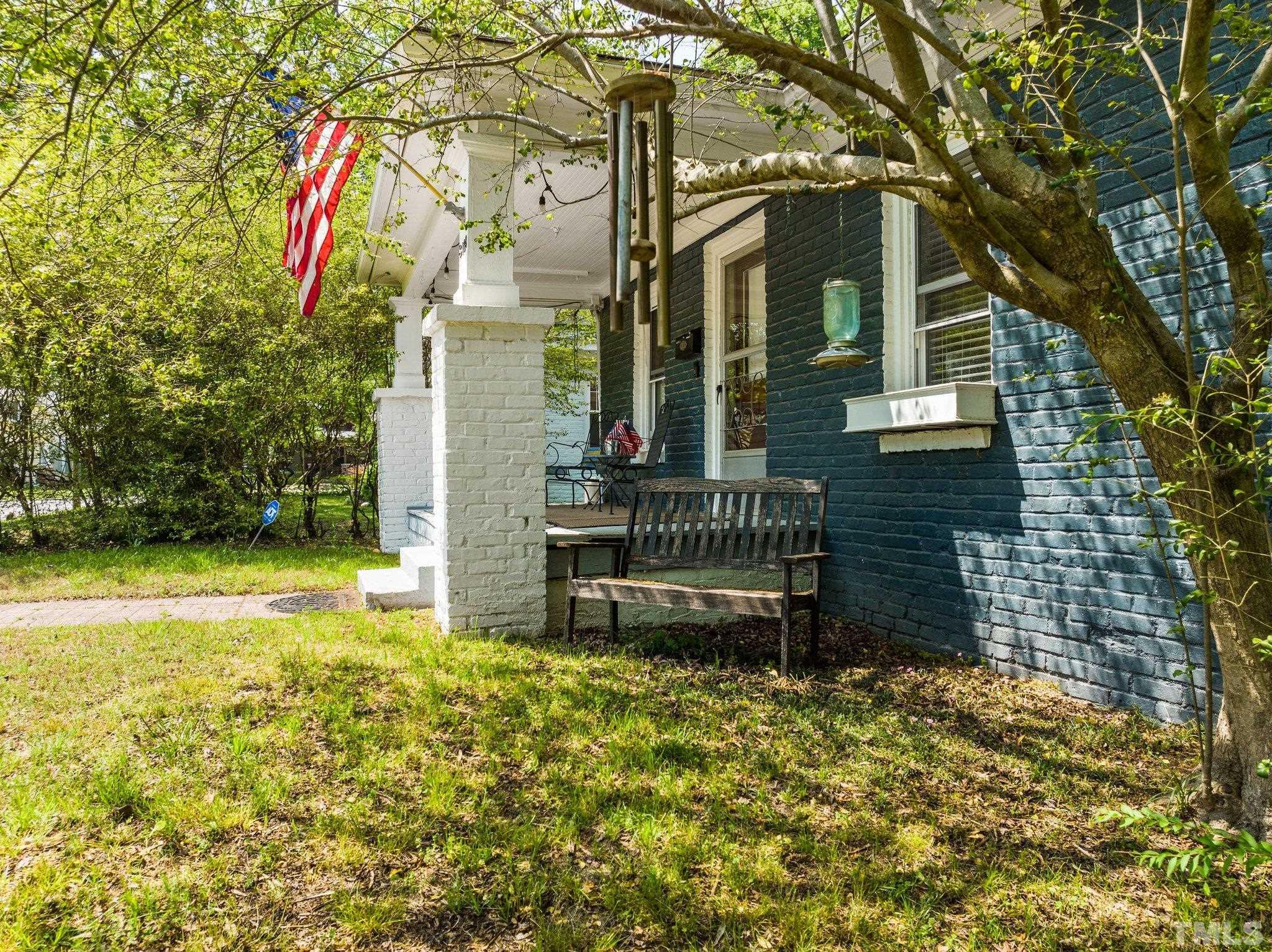 3128 Stanhope Avenue Raleigh, NC 27607 - Photo 9 of 40 a backyard of a house with lots of green space