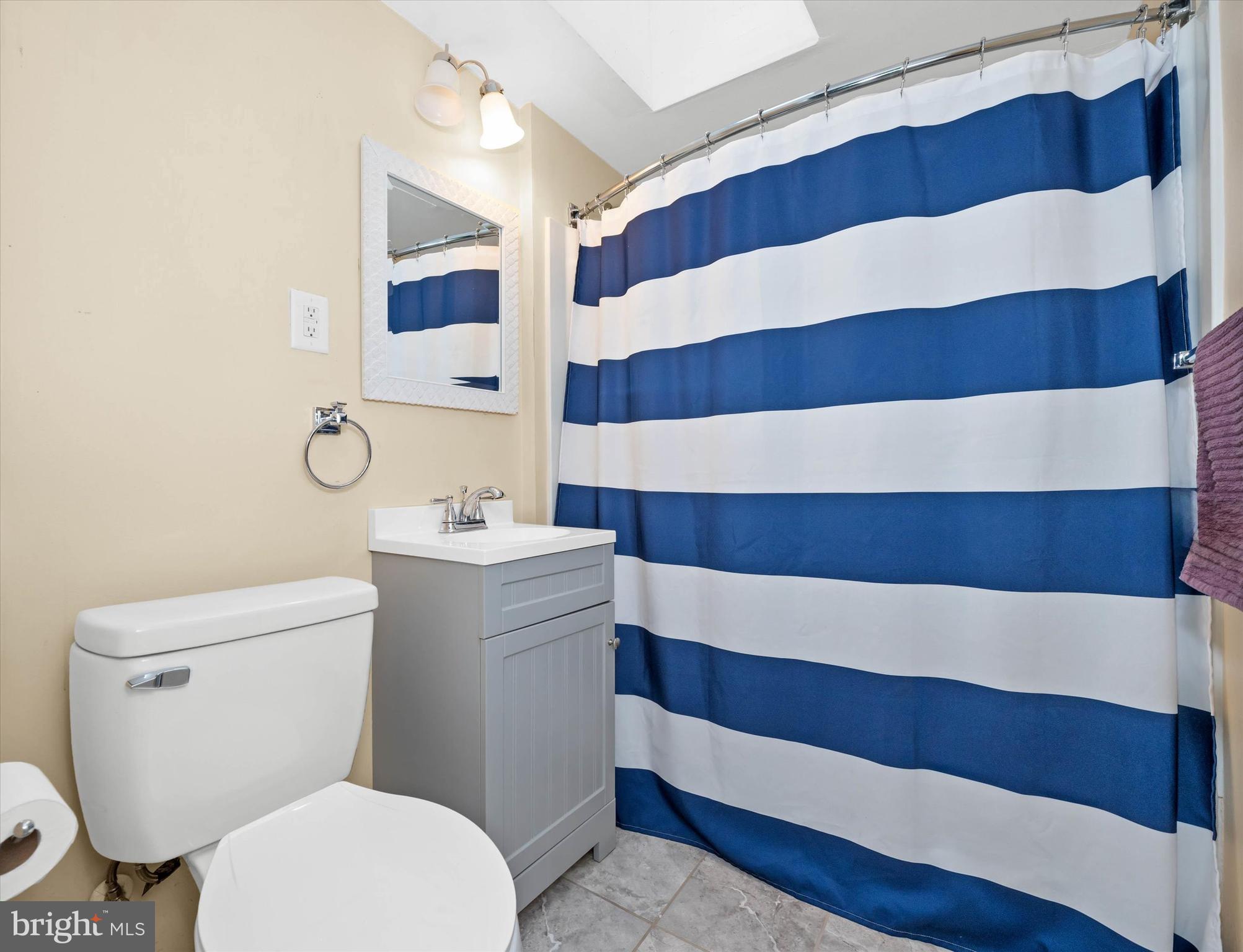 1950 Prospect Road Wilmington, DE 19805 - Photo 17 of 27 a bathroom with a sink and a mirror