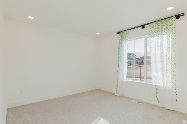 433 North 600 West Smithfield, UT 84335 - Photo 24 of 40 Bright interior space featuring light neutral wall paint and carpeting