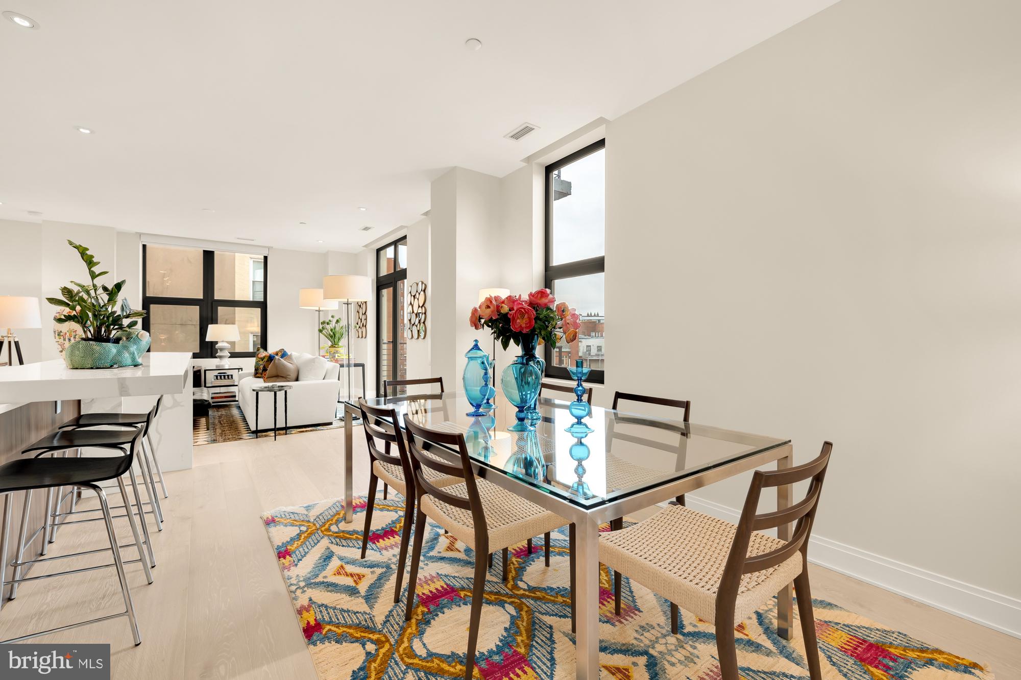 1427 Rhode Island Avenue Northwest, Unit 404 Washington, DC 20005 - Photo 15 of 35 a dining room with furniture and wooden floor