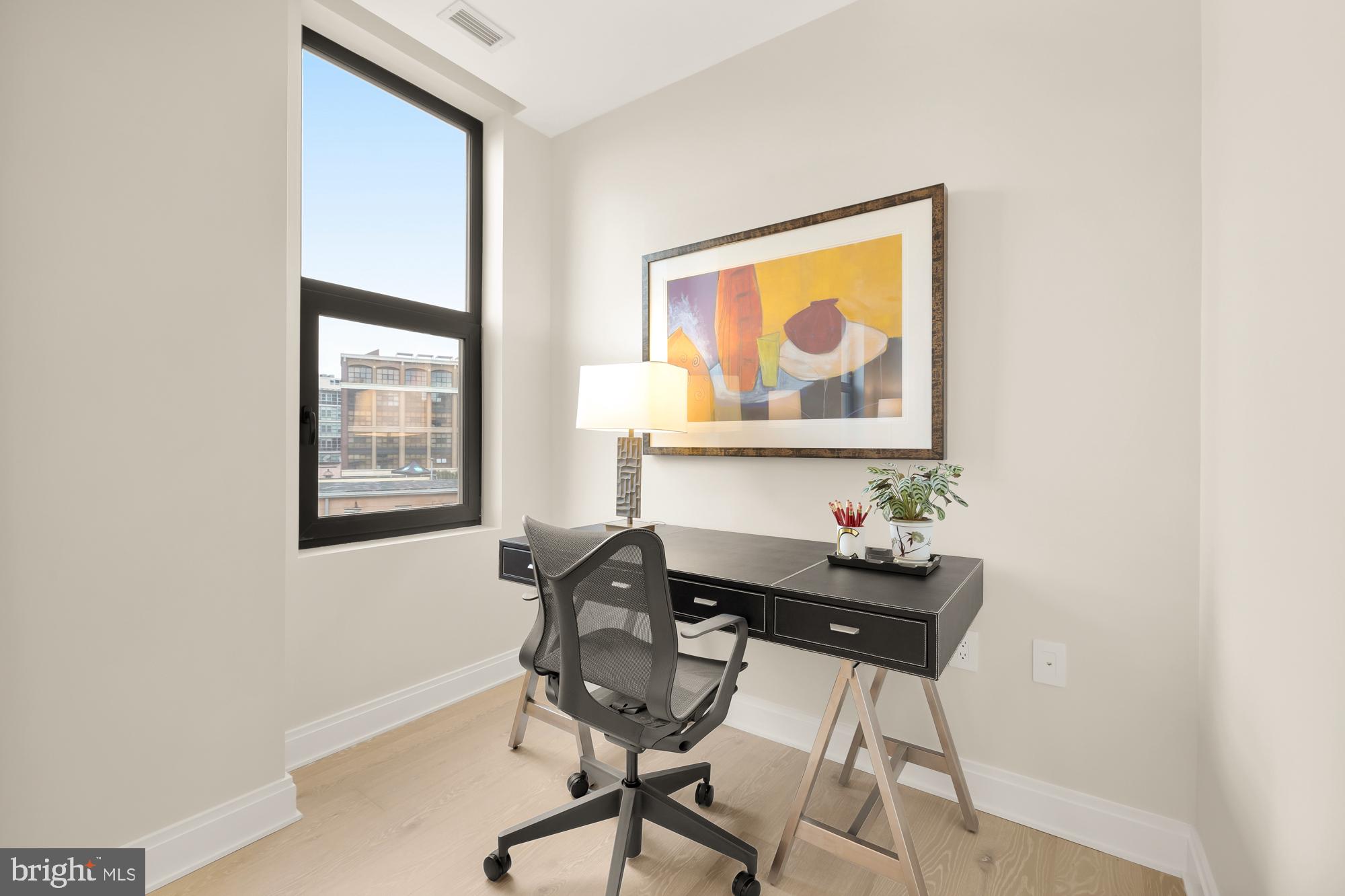 1427 Rhode Island Avenue Northwest, Unit 404 Washington, DC 20005 - Photo 17 of 35 a dining room with furniture and window