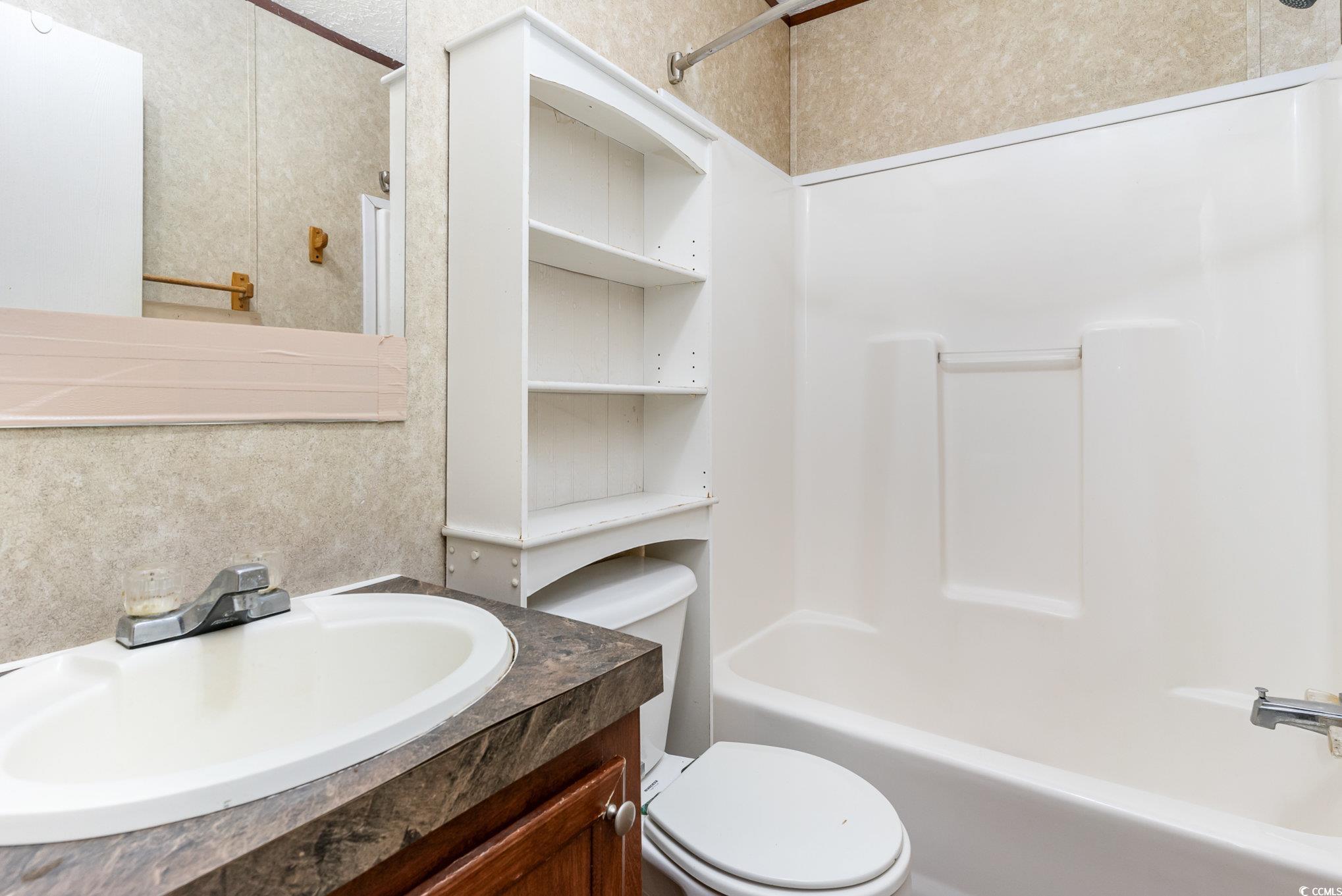 2100 Highway 15 Myrtle Beach, SC 29577 - Photo 17 of 35 Full bathroom with tub / shower combination, vanity, and toilet