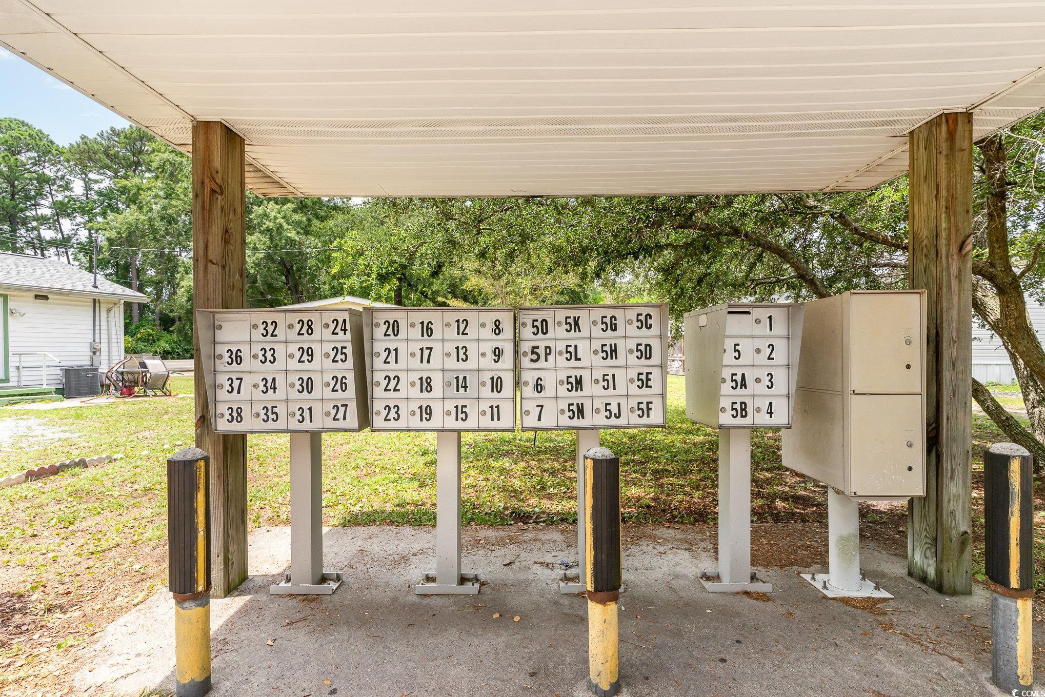2100 Highway 15 Myrtle Beach, SC 29577 - Photo 23 of 35 Exterior space with mail boxes and a lawn