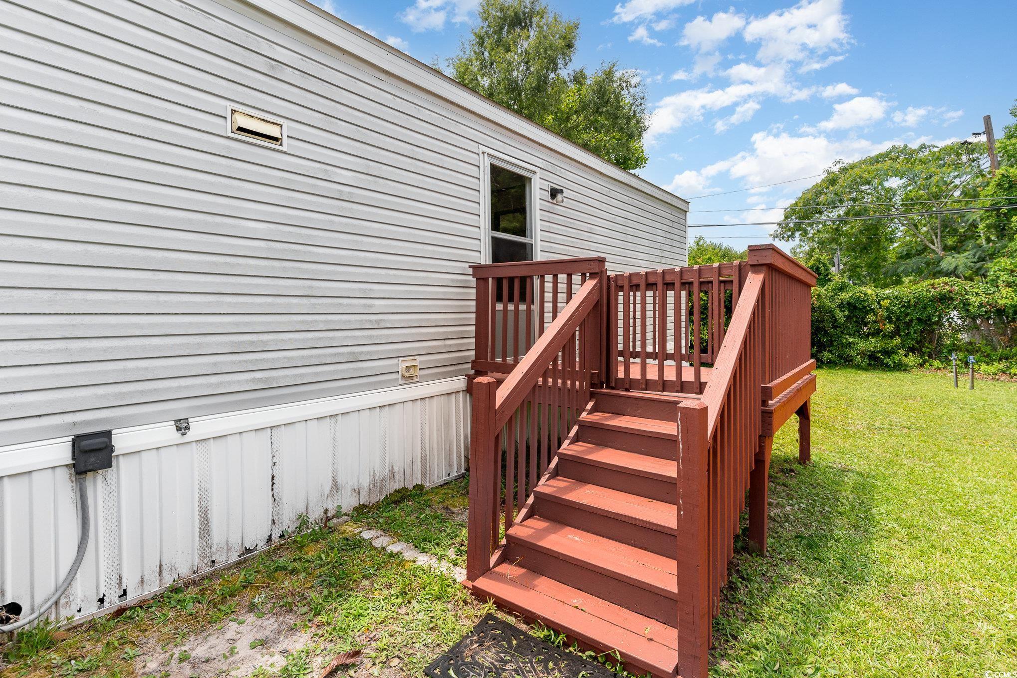 2100 Highway 15 Myrtle Beach, SC 29577 - Photo 30 of 35 Wooden deck featuring a yard