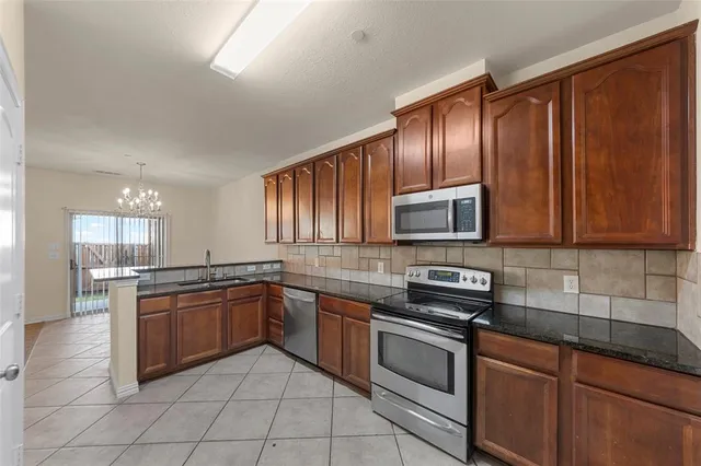 a view of a storage & utility room with closet area