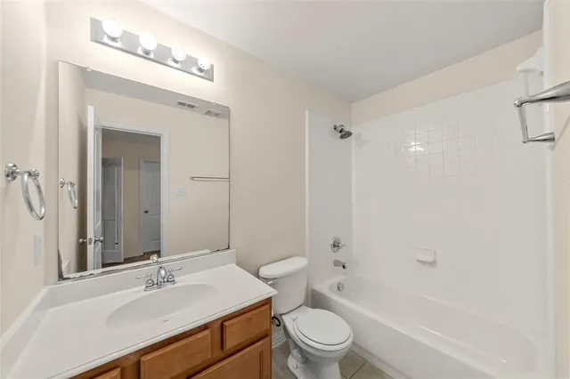 a view of hallway with wooden floor