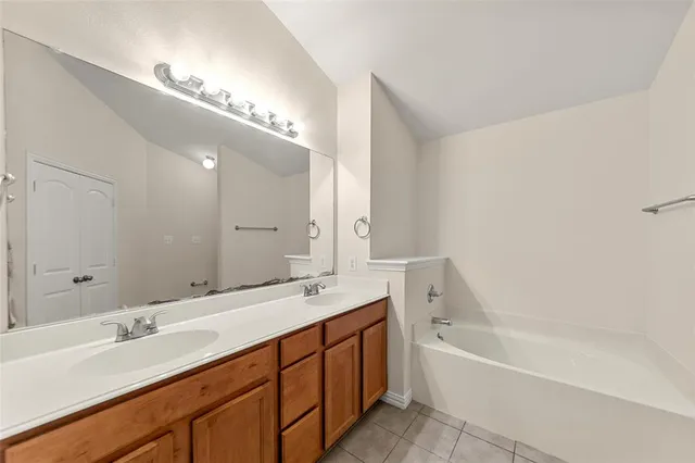 a view of a room with wooden floor and windows