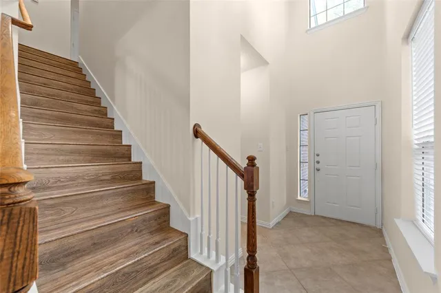 a view of entryway with wooden floor