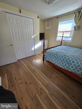 a room with furniture and white walls