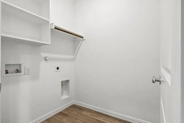 a view of small space with wooden floor