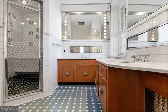 a front view of a house with many windows