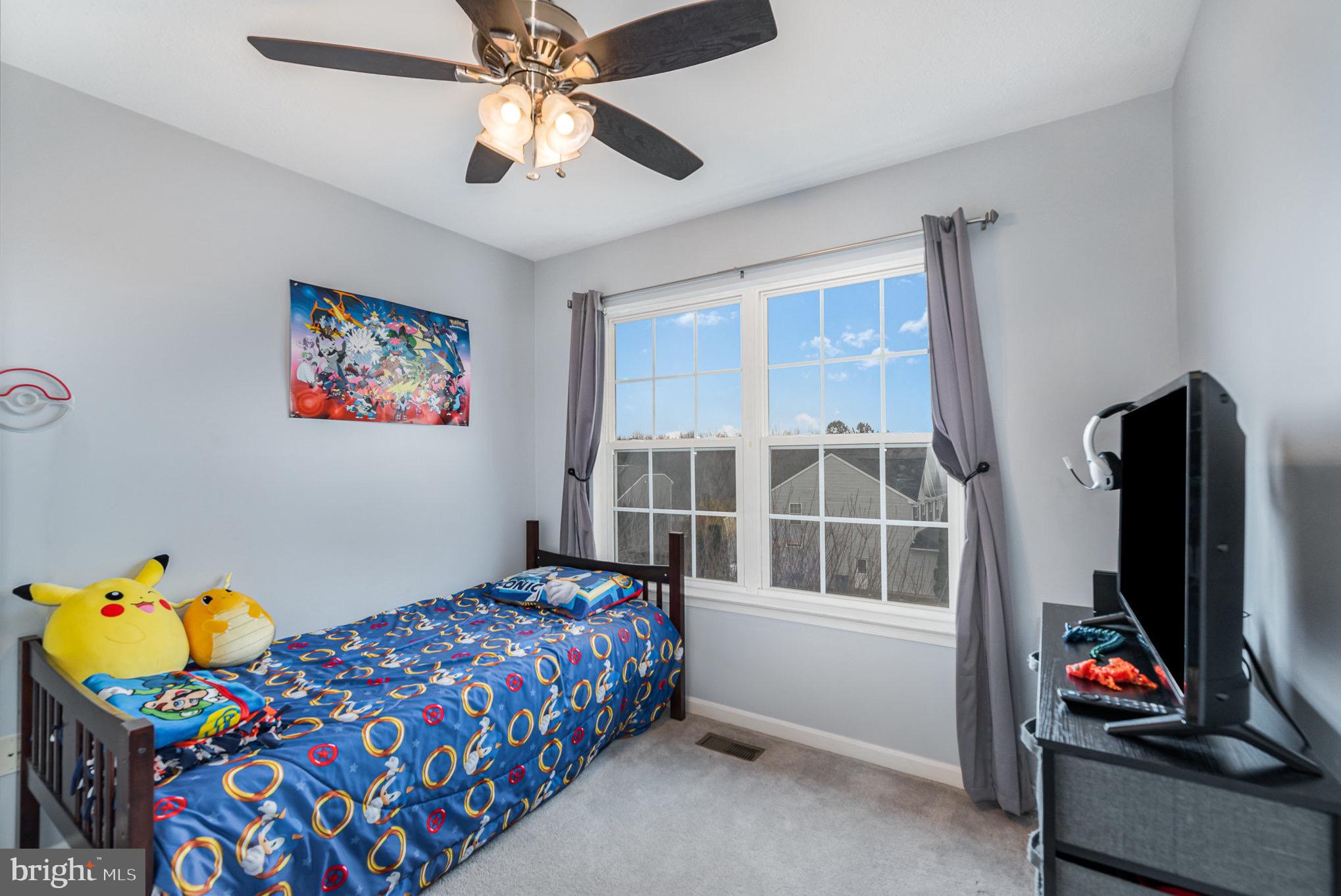 118 Maple Leaf Drive Rising Sun, MD 21911 - Photo 20 of 29 a bedroom with a bed and a window