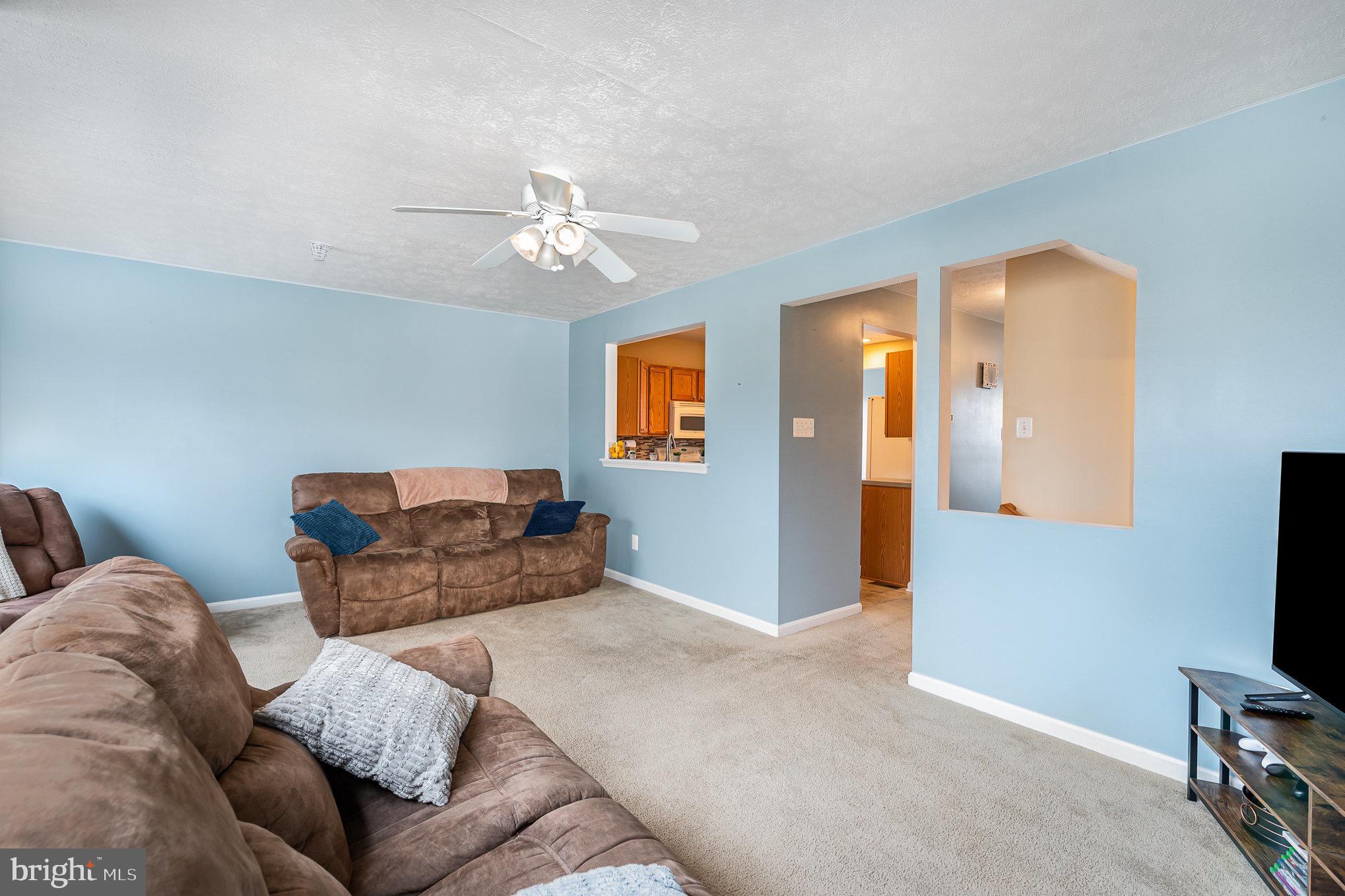 118 Maple Leaf Drive Rising Sun, MD 21911 - Photo 6 of 29 a bedroom with a bed and a flat screen tv
