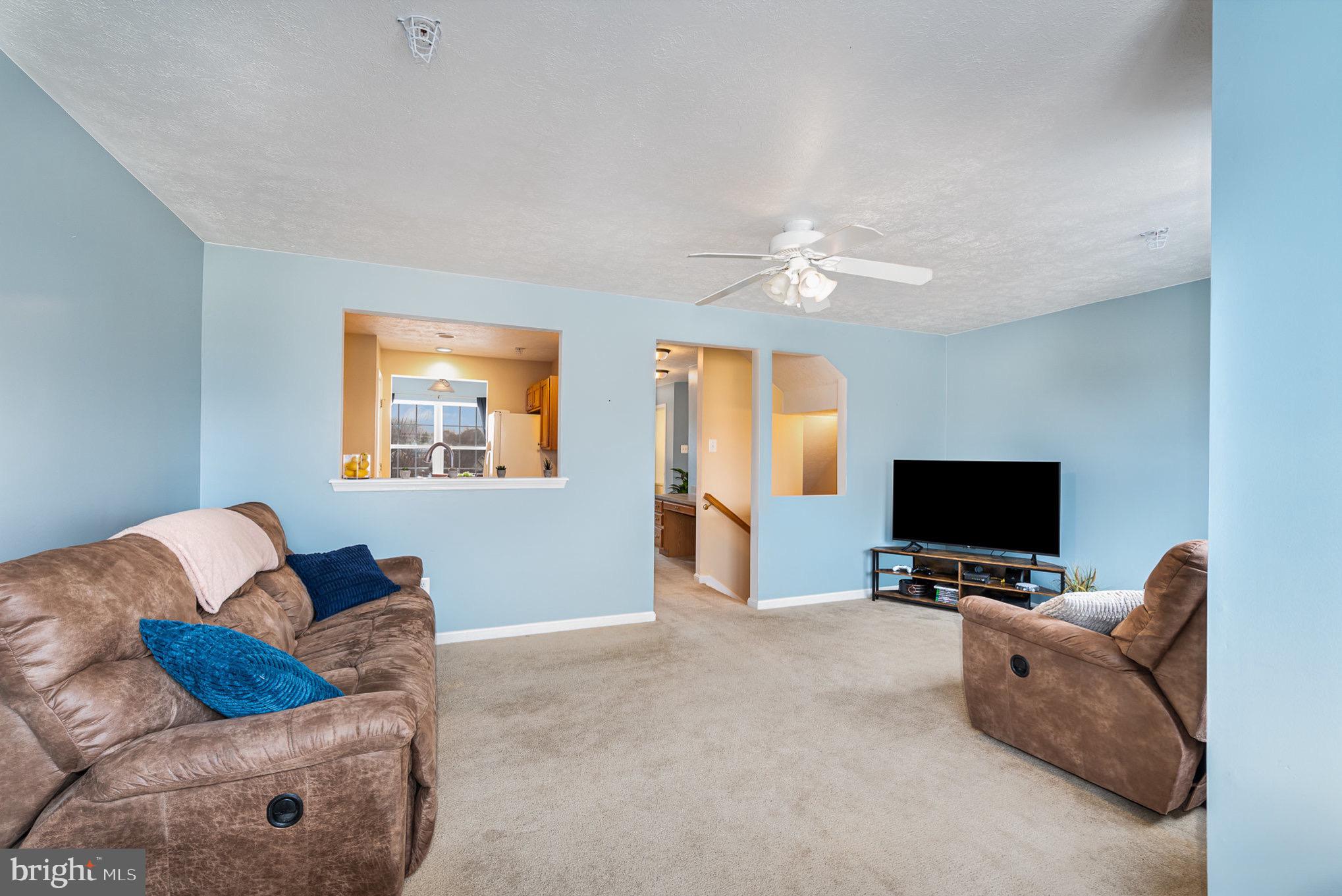 118 Maple Leaf Drive Rising Sun, MD 21911 - Photo 7 of 29 a living room with furniture and a flat screen tv