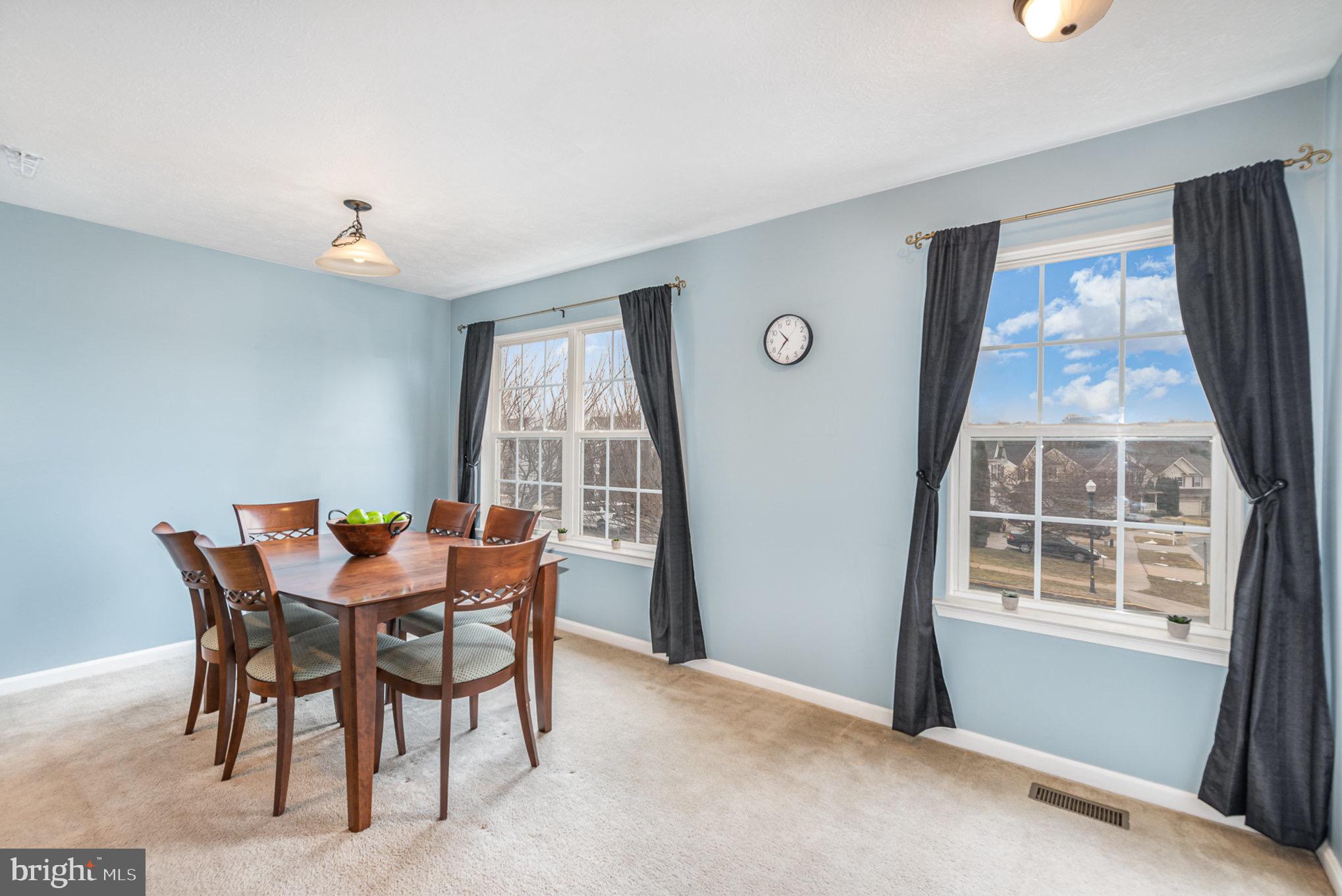 118 Maple Leaf Drive Rising Sun, MD 21911 - Photo 8 of 29 a view of a dining room with furniture and windows