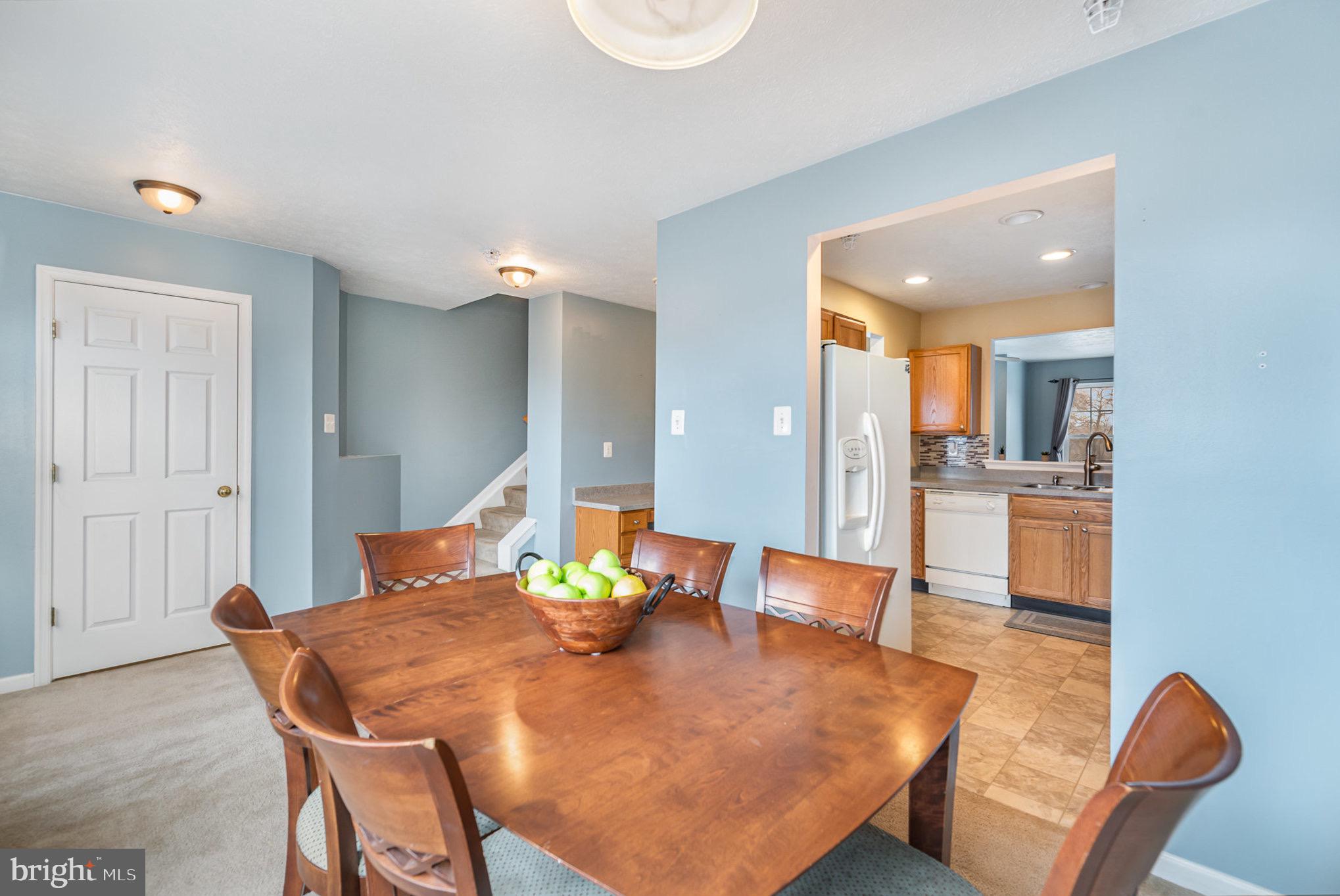 118 Maple Leaf Drive Rising Sun, MD 21911 - Photo 10 of 29 a view of a dining room with furniture and wooden floor