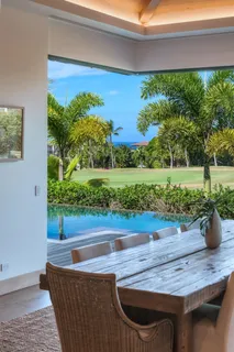 a view of a yard with an outdoor seating