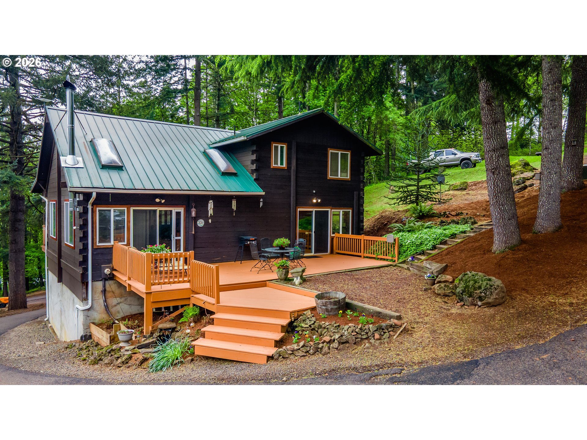 5278 Pearson Road Southeast Turner, OR 97392 - Photo 1 of 48 a backyard of a house with seating space