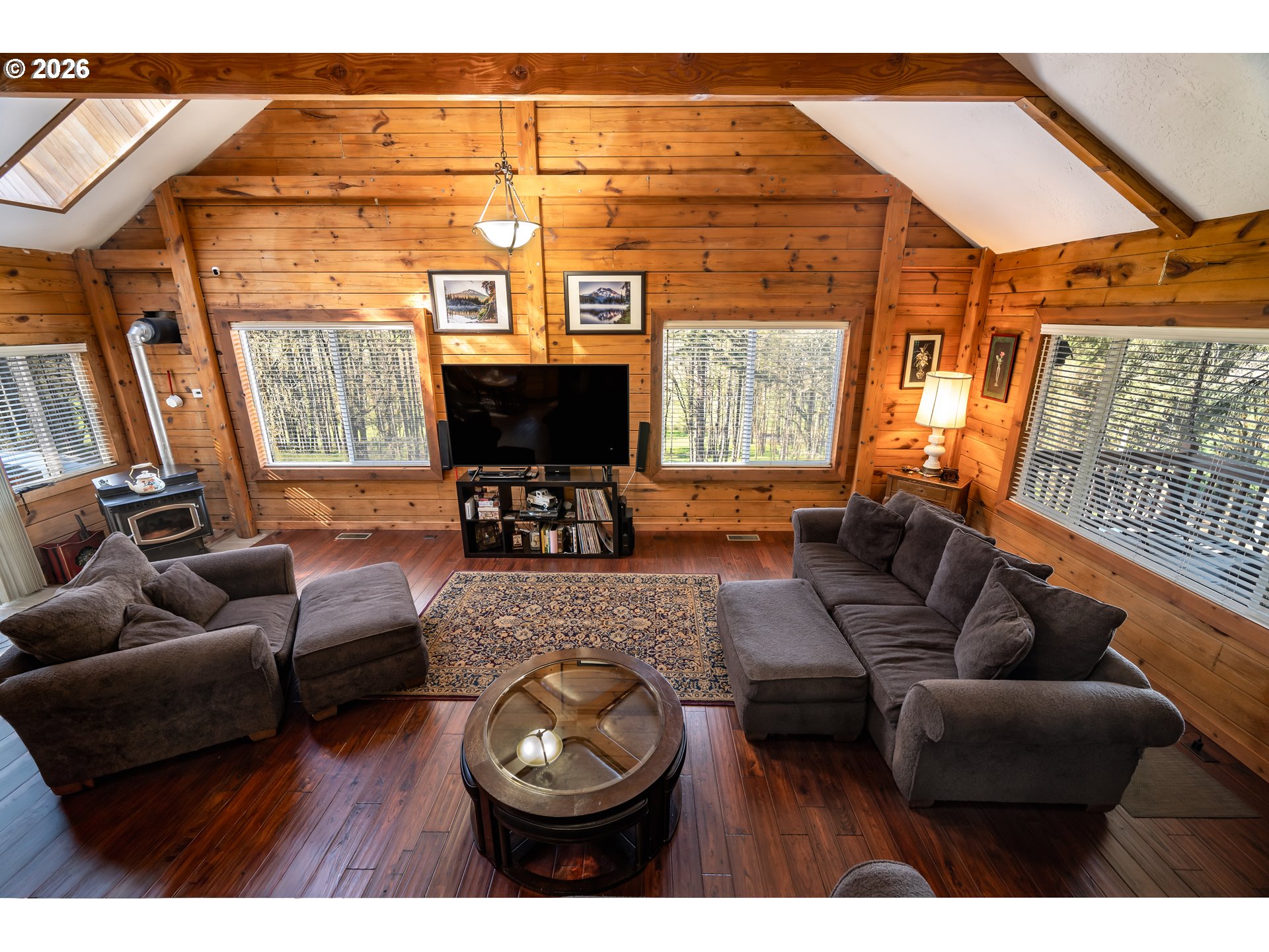 5278 Pearson Road Southeast Turner, OR 97392 - Photo 22 of 48 a living room with furniture a fireplace and a flat screen tv