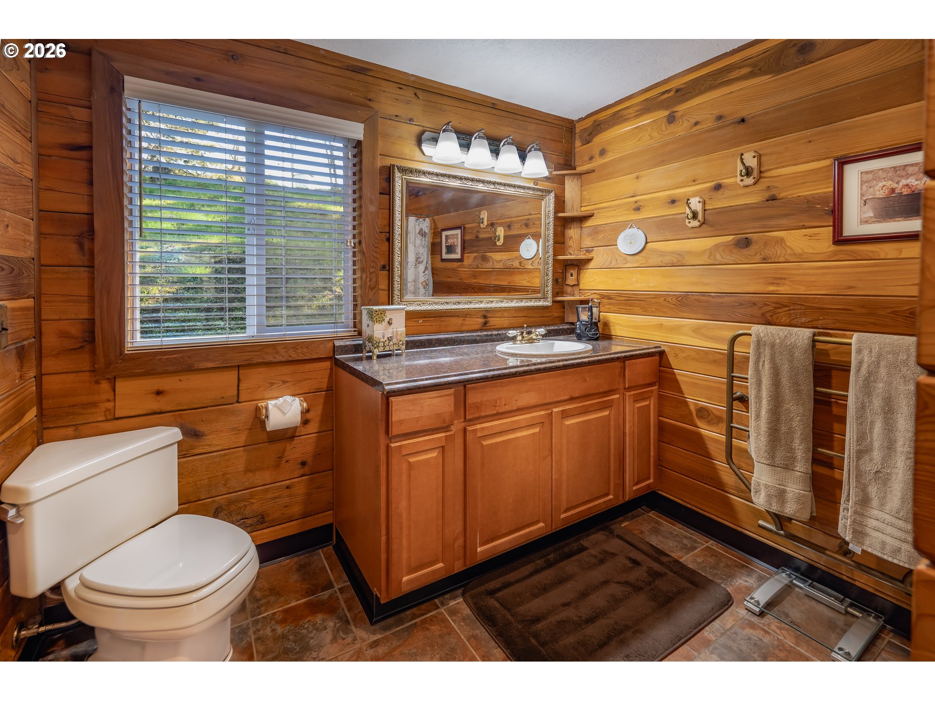 5278 Pearson Road Southeast Turner, OR 97392 - Photo 31 of 48 a bathroom with a granite countertop sink and a toilet