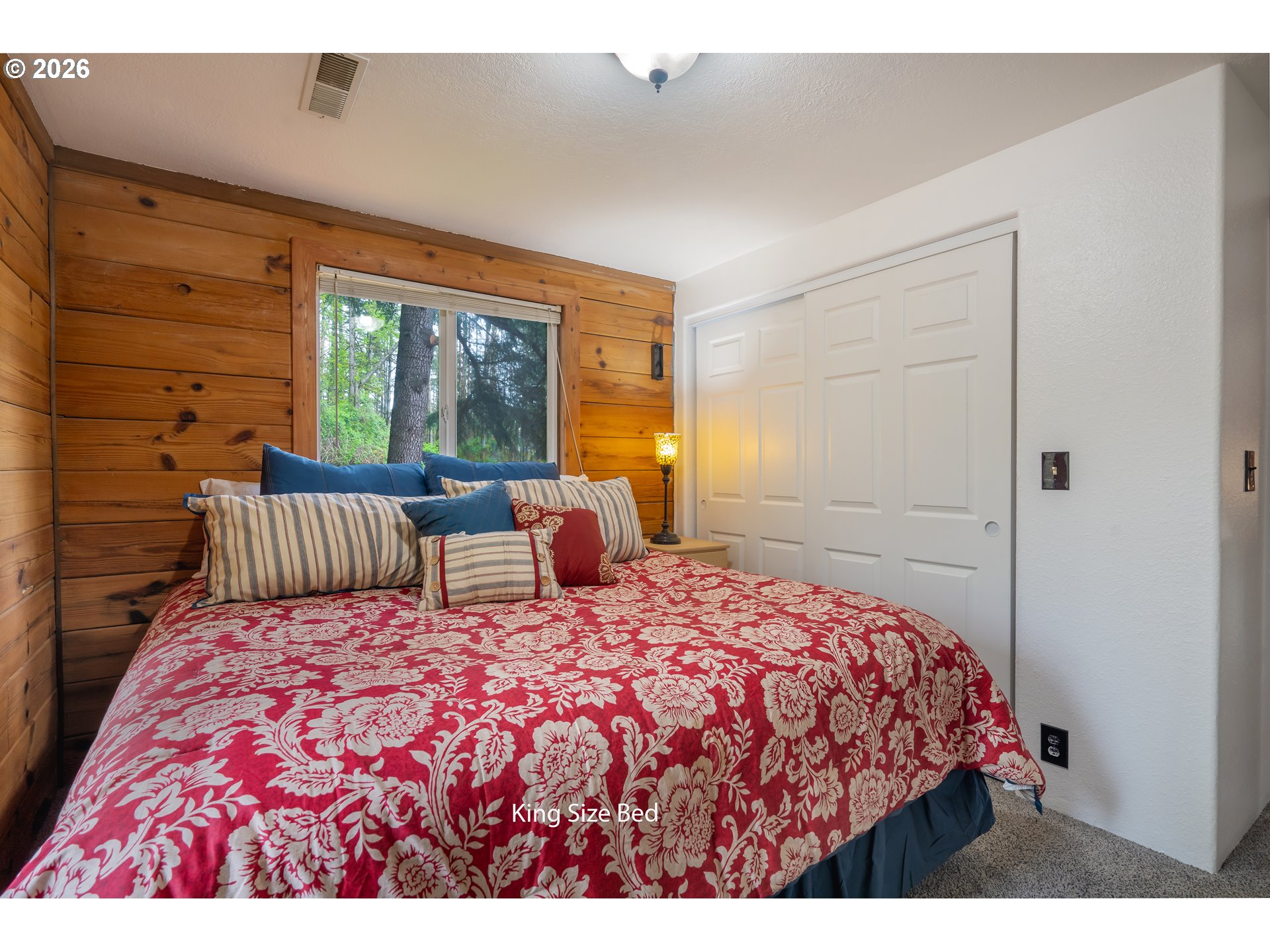 5278 Pearson Road Southeast Turner, OR 97392 - Photo 38 of 48 a bedroom with a large bed and a large window