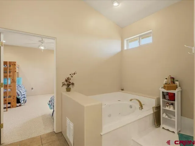a bathroom with a double vanity sink mirror and double