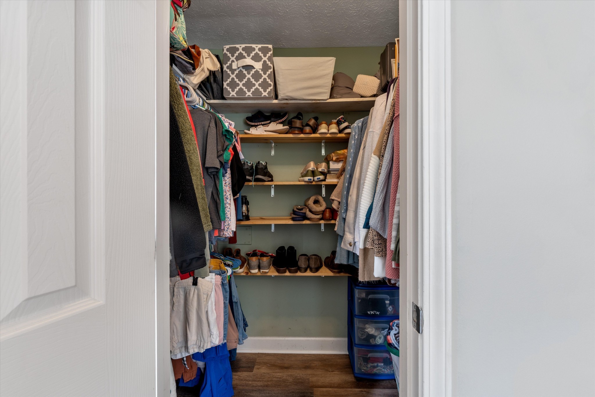 486 Sylvis Road Dickson, TN 37055 - Photo 14 of 24 a view of walk in closet with clothes and shoes