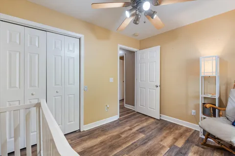 a view of a bedroom with closet area