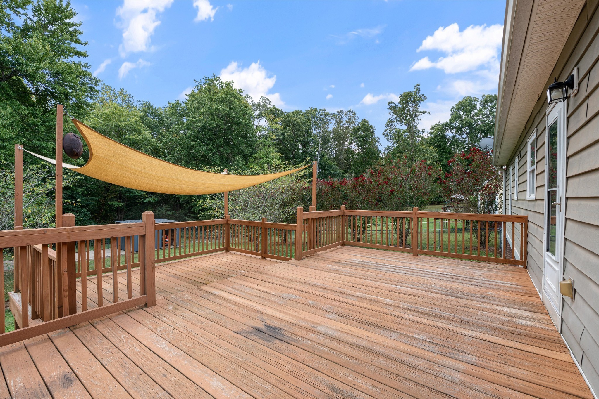 486 Sylvis Road Dickson, TN 37055 - Photo 22 of 24 a view of a balcony with wooden floor and fence