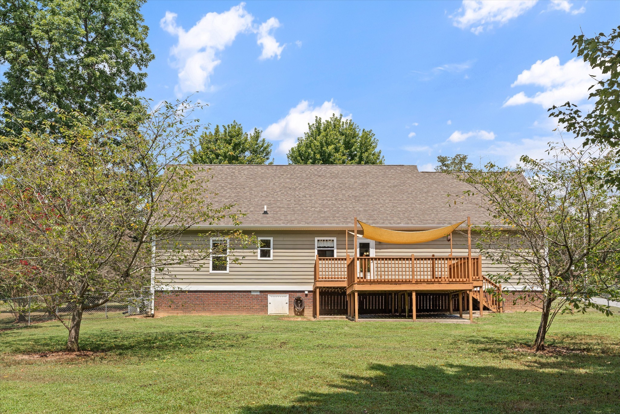 486 Sylvis Road Dickson, TN 37055 - Photo 23 of 24 a view of a house with a swimming pool