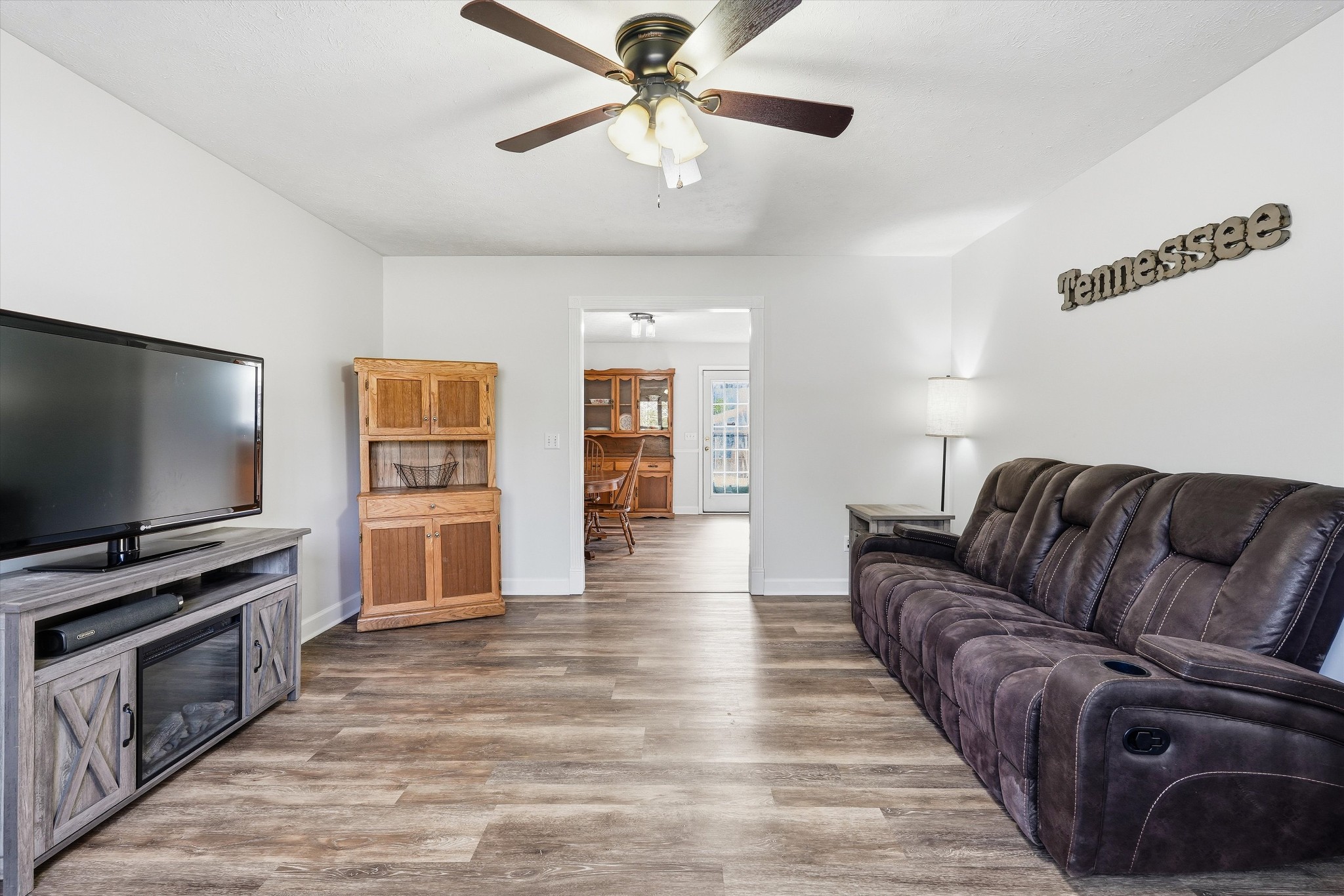 486 Sylvis Road Dickson, TN 37055 - Photo 5 of 24 a living room with furniture and a flat screen tv