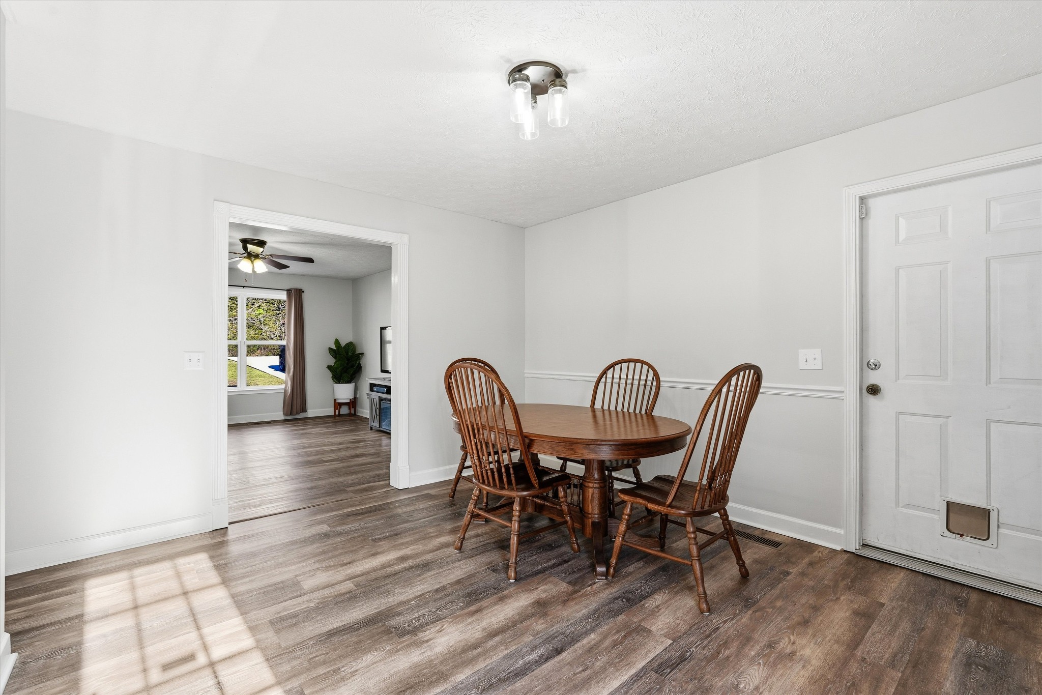 486 Sylvis Road Dickson, TN 37055 - Photo 9 of 24 a view of a dining room with furniture and wooden floor