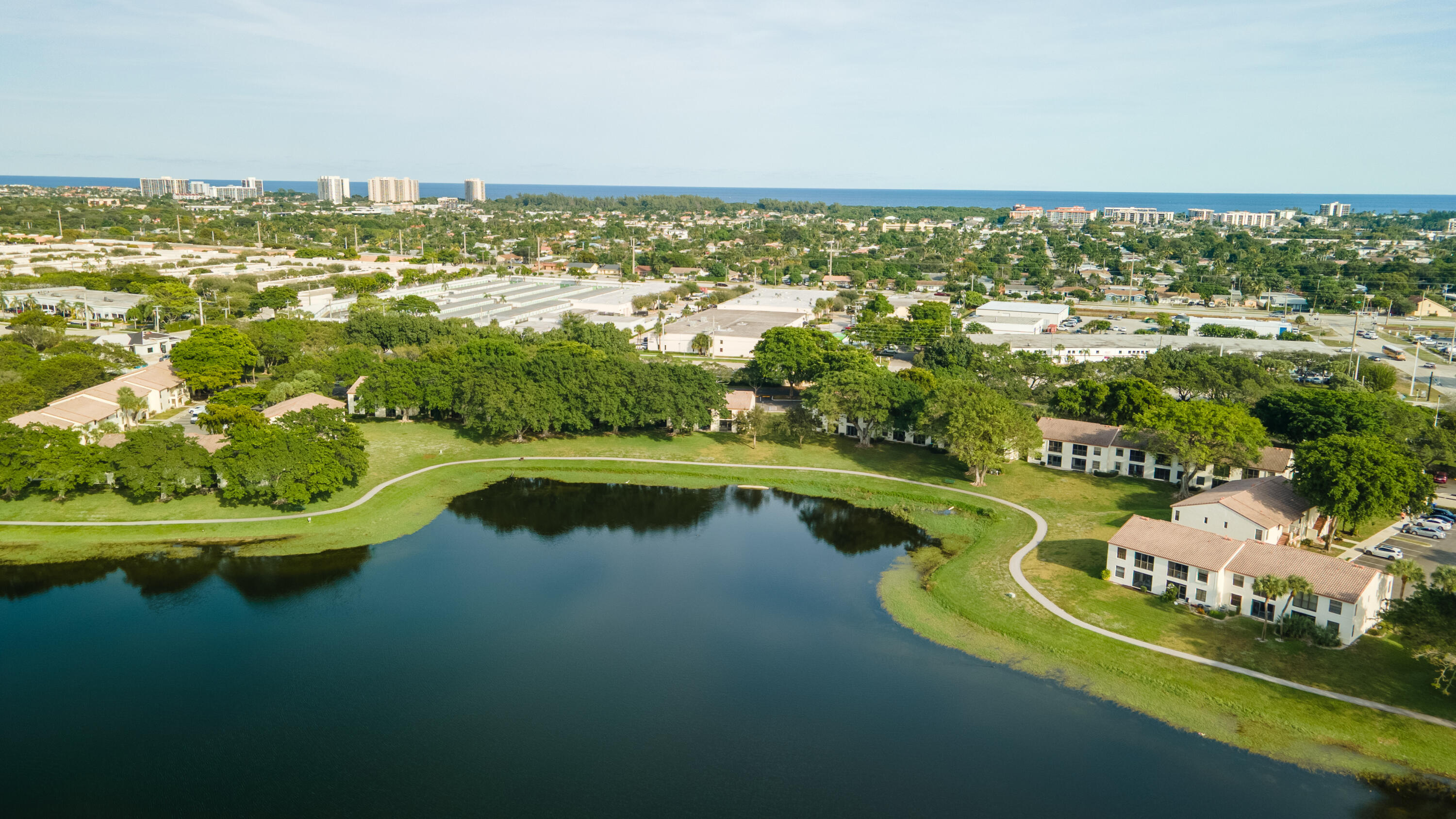 2900 Olivewood Terrace, Unit 2010 Boca Raton, FL 33431 - Photo 2 of 22 a view of a lake with a city